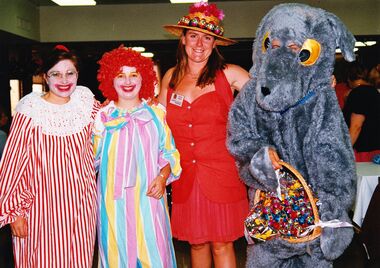 4 people - 2 dressed in clown outfits, 1 with an Eastern bonnet and 1 dressed as a bunny - at Elanora