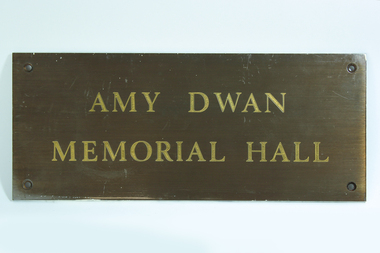 Amy Dwan Memorial Hall plaque