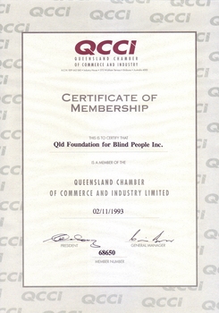 Grey and white paper with QCCI lettering