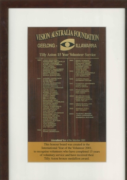 Wooden boards inscribed with names of volunteers.