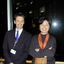 Karl Hughes and Jennifer Yang in the corridor