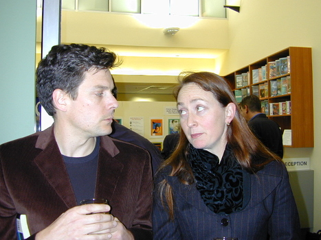 David Tredinnick and Caroline Lee stand at the doors to the library
