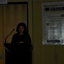 Narrator Melissa Eccleston at the podium