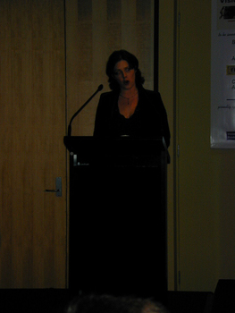 Narrator Rebecca Macauley at the podium