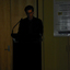 Narrator Paul English at the podium