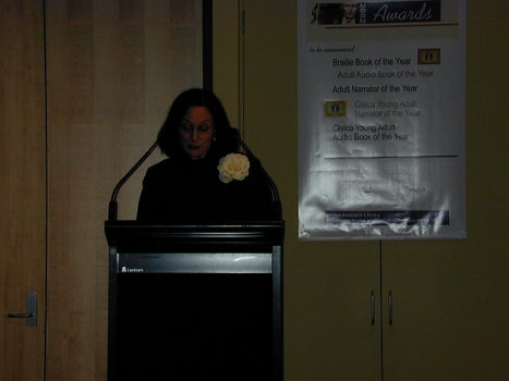 Narrator Deidre Rubenstein at the podium