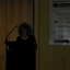 Narrator Evelyn Krape at the podium