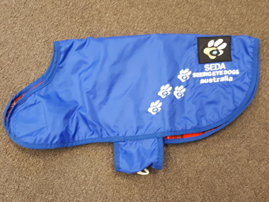 Blue polyster dog coat with fleece tartan lining
