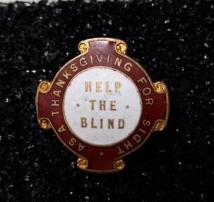 Red and white badge with gold edging