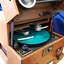 Leather covered box with flip top and turntable with two heads for inscribing and reading, metal speaking tube and various knobs and levers