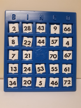 Plastic board with cutouts for paper numbers