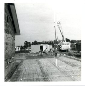 Laying out of concrete base for building extension