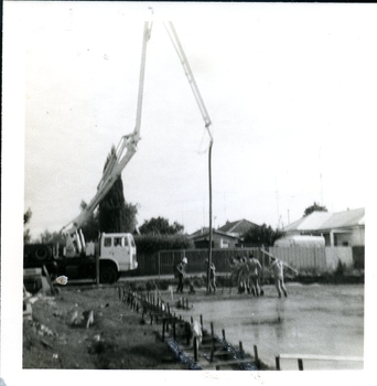 Pouring of concrete base for building extension