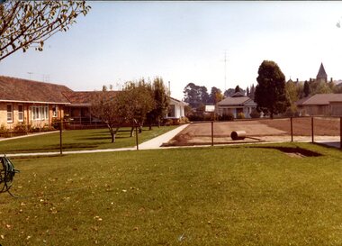 Grassed area between buildings at Kelaston