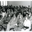 Audience members listen to Sir Henry Bolte