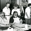 A female staff member shows a visitor activities in the craft room