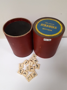 Cylindrical container containing braille letters