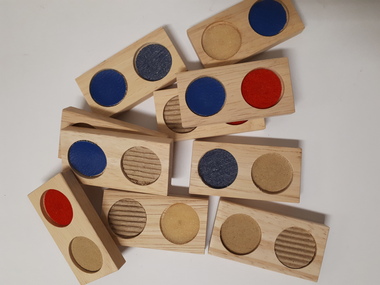 10 dominoes textured dots in red, blue, light brown