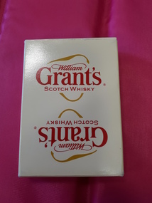 White card packet with large red writing