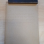 Wooden board with two hinges and braille paper