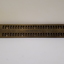 Metal guide with two lines of 25 cells