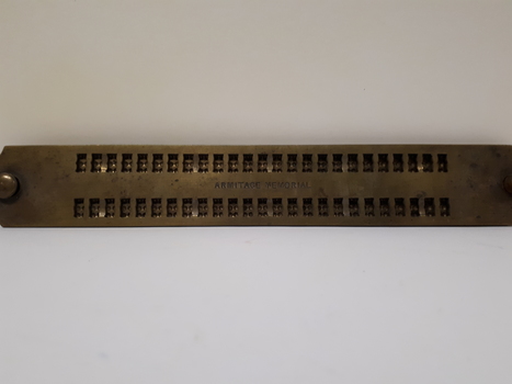 Metal guide with two lines of 25 cells