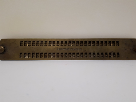 Metal guide with two lines of 25 cells