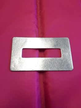 Metal rectangle with rectangle cut out of middle