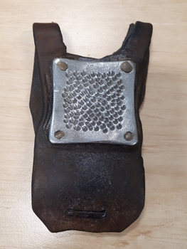 Palm sized leather harness with metal square