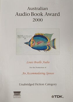 White paper with illustration of fish and writing in red and black