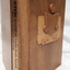 Wooden cassette box with title of award and name of book on spine