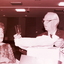 Janet and John Wicking looking at the glassware gifts