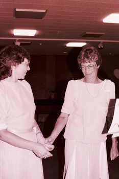 Two women addressing the audience