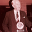 John Wicking proudly wearing his Rara Avis medal