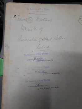 Front page with handwritten and stamps