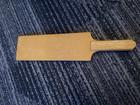Unpainted, wooden bat with tapered handle
