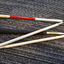 Cane folded into four segments on carpet