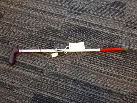 Four metal pieces with rubber tip and wooden handle