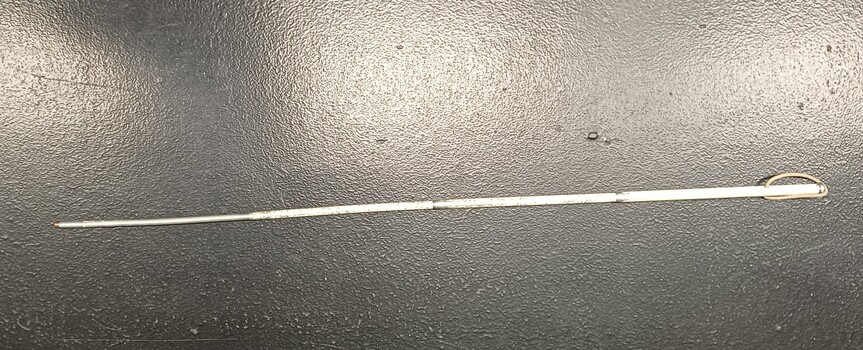 White cane showing length and bend