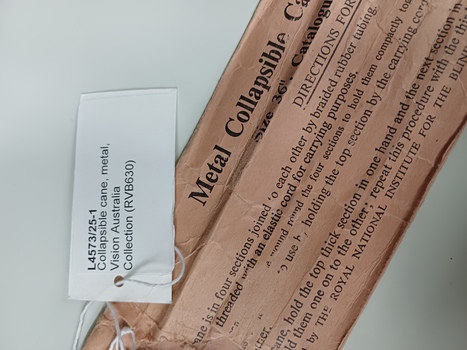 Paper packet and tag attached for exhibition