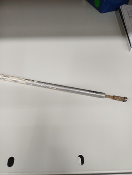 Loose tip of cane and removed paintwork