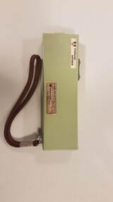 Green rectangular box with dark green lever on side