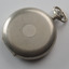 Silver fob watch with patterned cover
