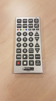Large silver rectangle box with white writing on black buttons and some coloured buttons
