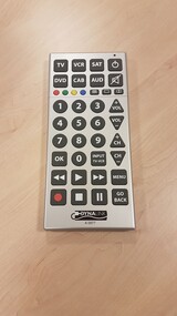 Large silver rectangle box with white writing on black buttons and some coloured buttons