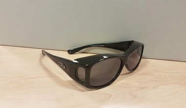 Black sunglasses with metal symbol on side arms