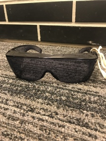 Black sunglasses with fit over cover