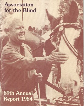 Arthur Wilkins pats a Clydesdale at the Kooyong Fair