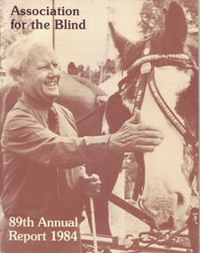 Arthur Wilkins pats a Clydesdale at the Kooyong Fair