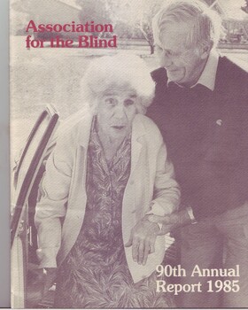 An elderly blind woman is assisted by a sighted man from a car